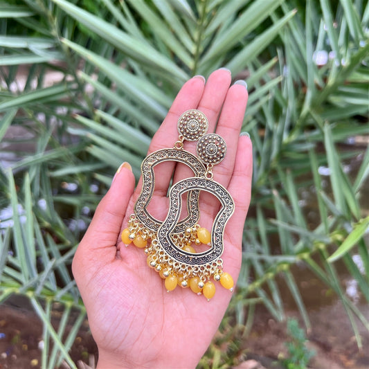 Designer Wavy Jhumka Earrings with Yellow Beads