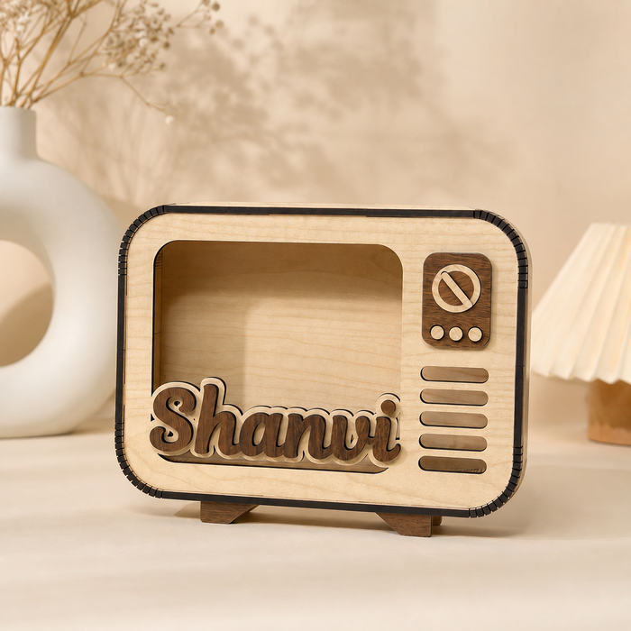 Front view of personalised radio-shaped piggy bank with custom name
