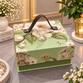 Sage green and ivory floral Kappa Board dry fruit gift box with brown carry handle