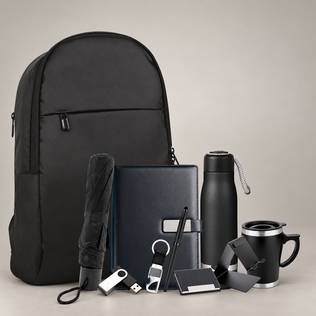 Corporate gift set 302: Unisex Laptop Backpack, A5 Magnetic Notebook, Metal Stylus Pen, 500 ml Vacuum Flask, 350 ml Steel Mug, Opener Keychain, Double-Sided Mobile Stand, Visiting Cardholder, 16 GB USB Drive & 3-Fold Umbrella